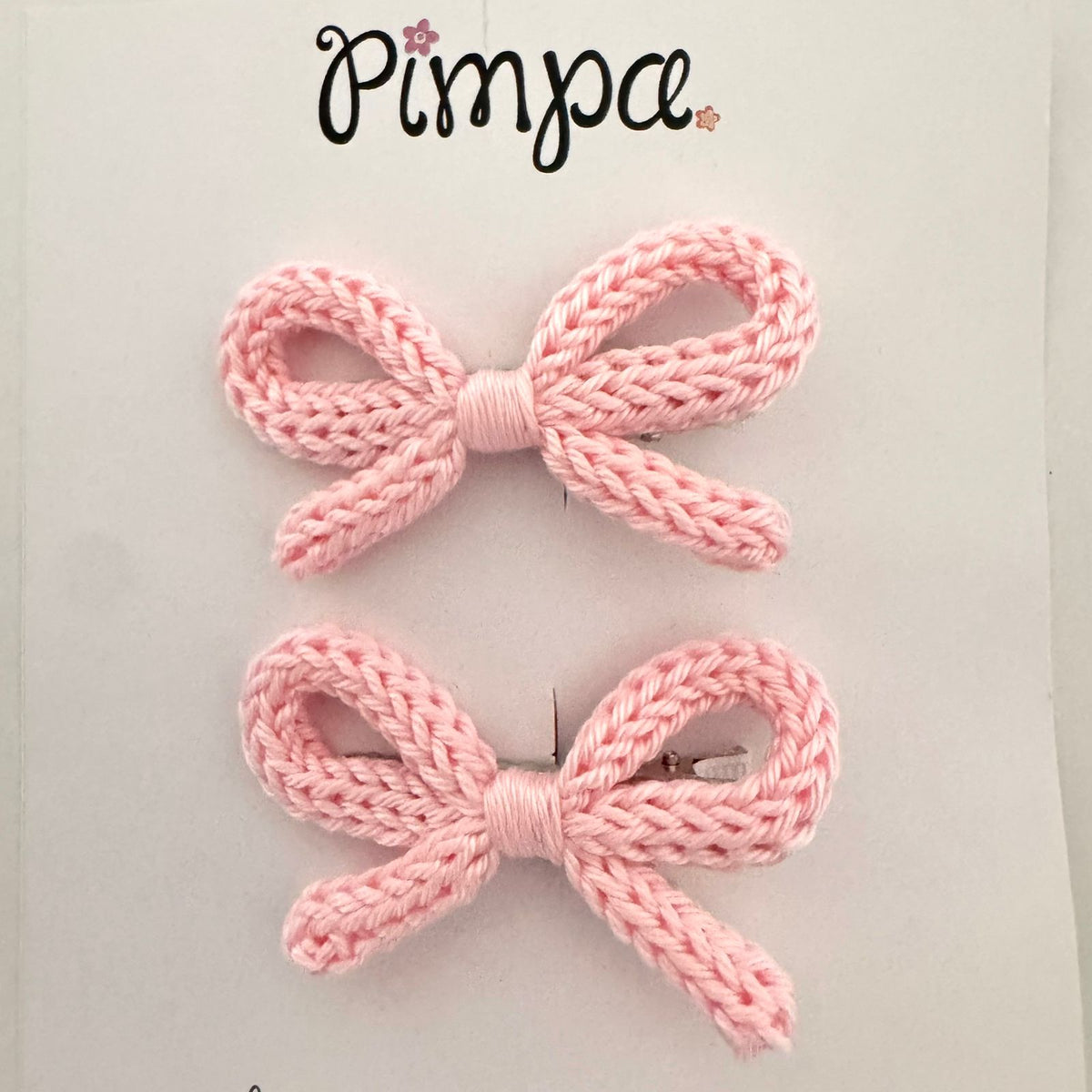 Par de moñitos tejidos Micaela en pinza