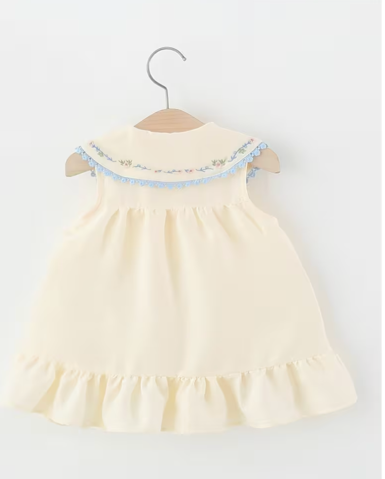 Vestido Antonella beige con cuello bordado y moños azules - foto 2