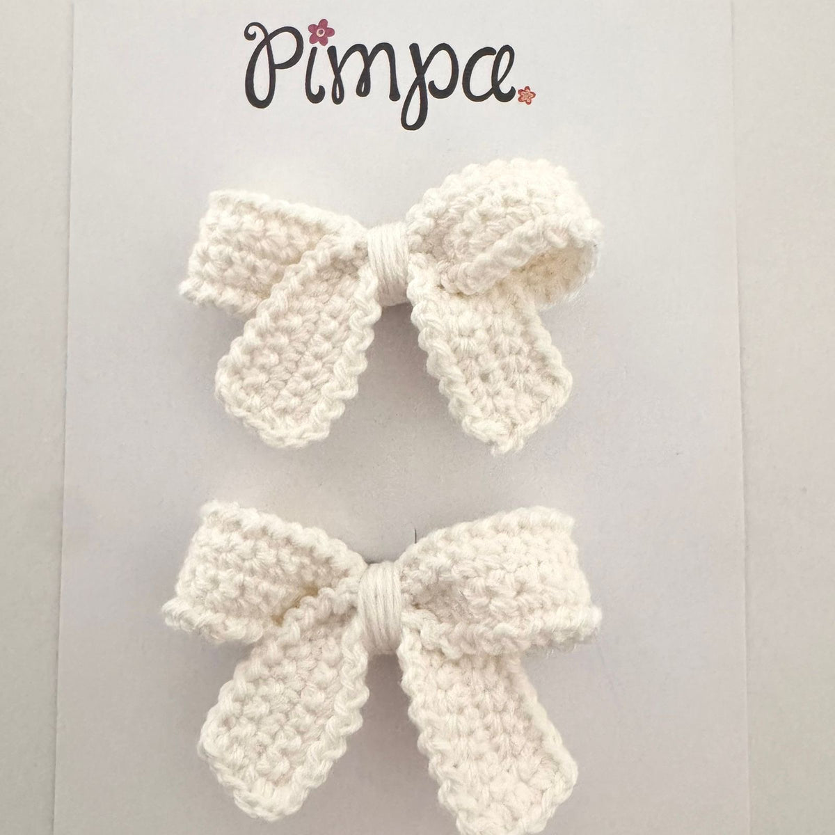 Par de pinzas con moño tejido Mini Carolina
